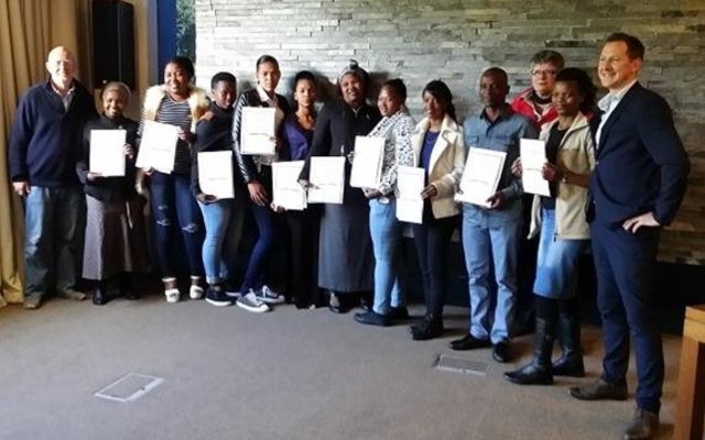 From ltr are Michael Lutzeyer, the students, Viola Syotywa, Susan Lochner and Craig Versfeld